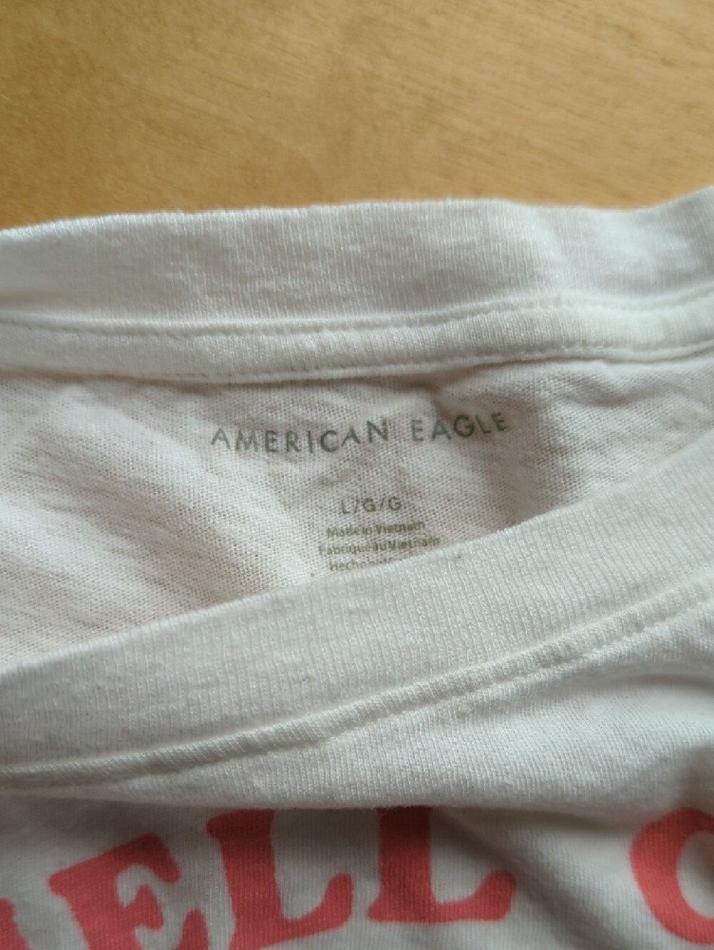 American Eagle Outfitters White Tee with Pink Shell Graphic - Picture 2 of 3